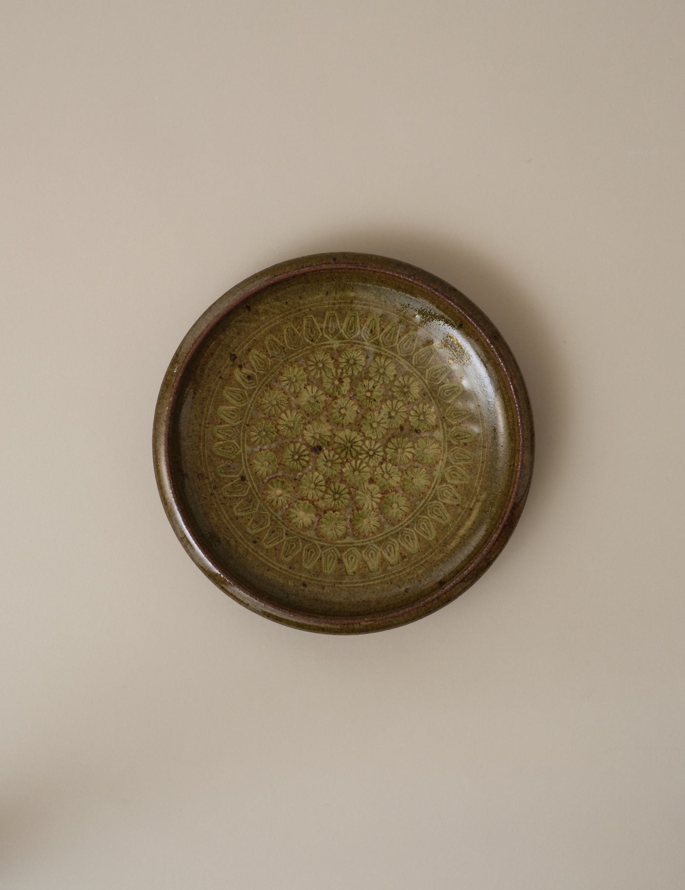 IMPRESSED FLORAL PATTERN GREEN PLATE