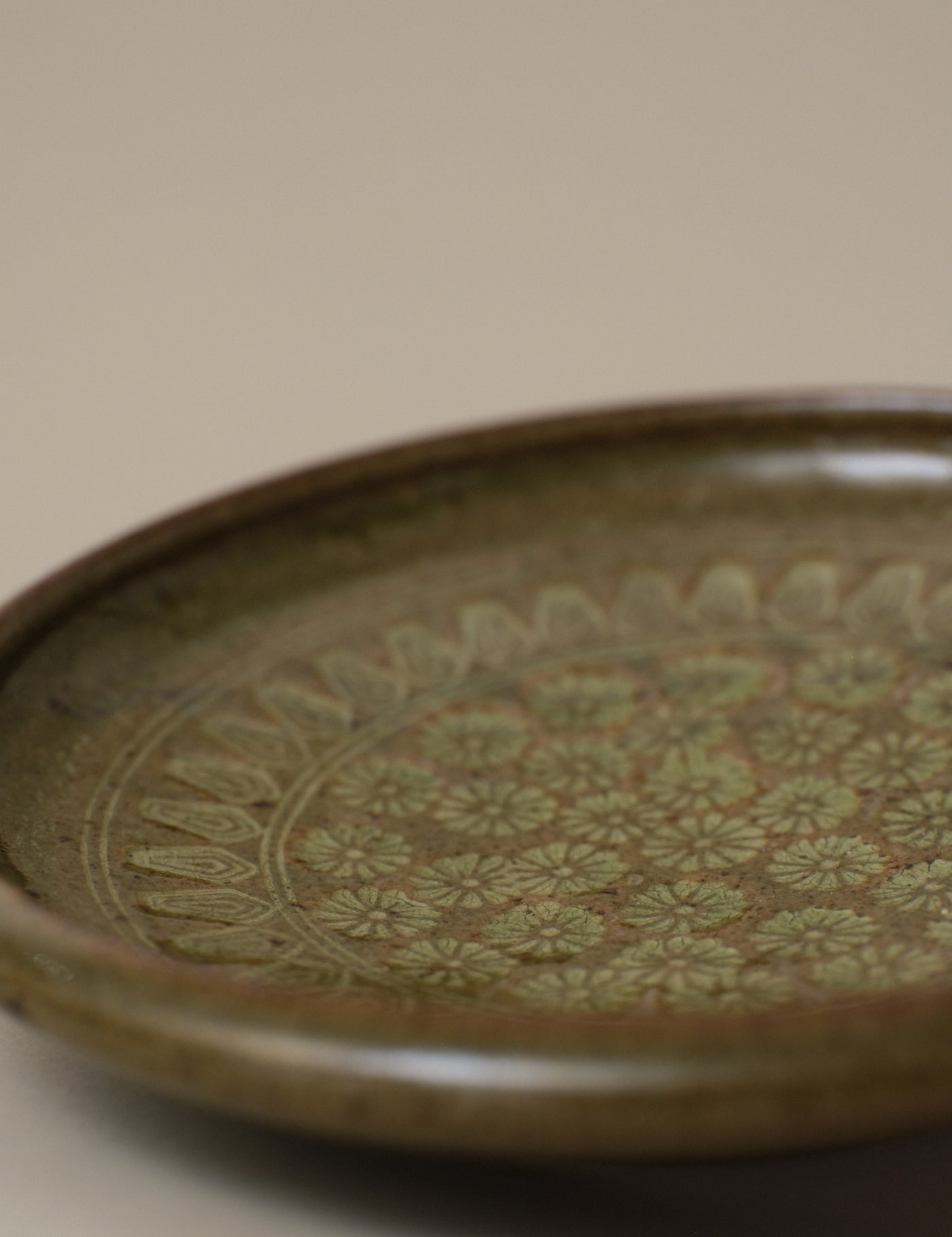 IMPRESSED FLORAL PATTERN GREEN PLATE