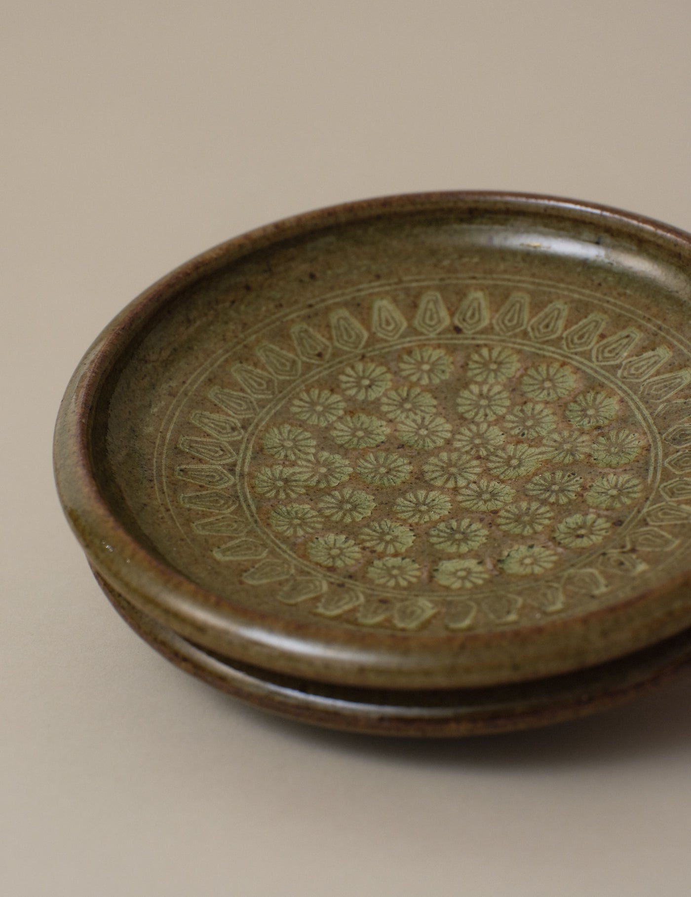 IMPRESSED FLORAL PATTERN GREEN PLATE